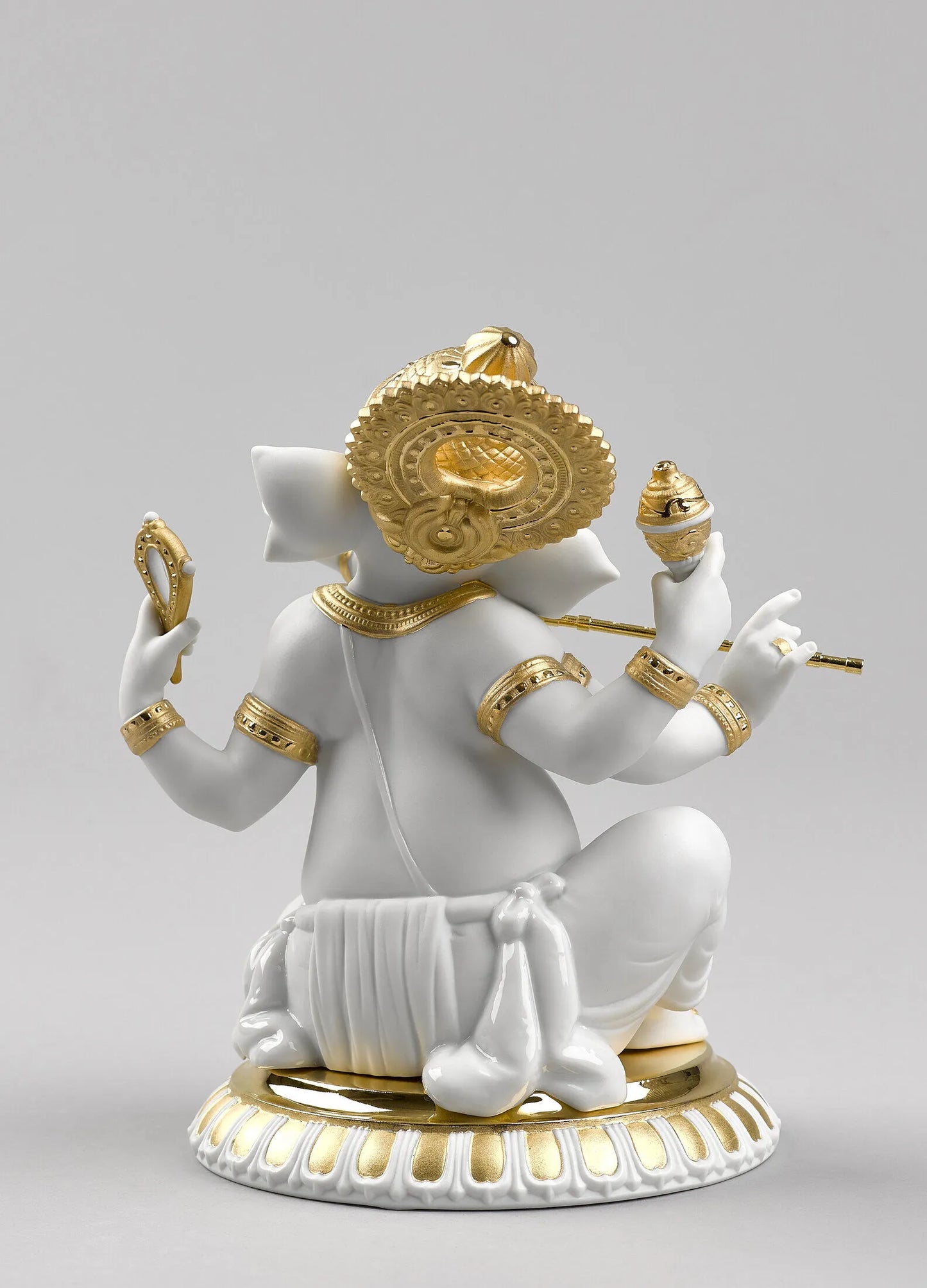 Bansuri Ganesha Figurine. Golden Lustre
