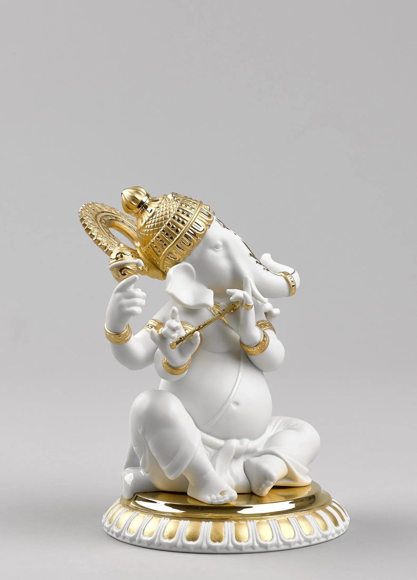 Bansuri Ganesha Figurine. Golden Lustre