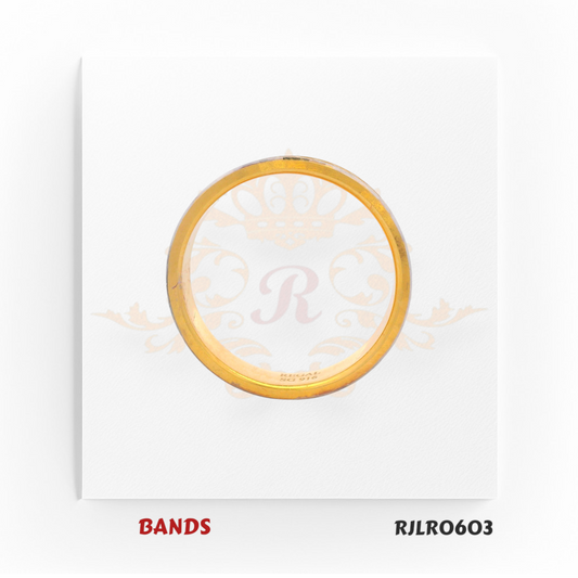 Modern 22kt dual-tone gold band featuring a polished yellow gold base highlighted by a stylish white gold diagonal groove. Model RJLR0603 offers a bold yet refined touch for any jewelry collection.