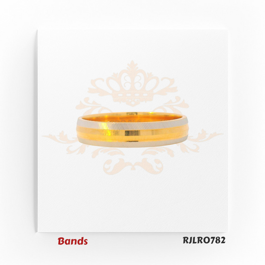 Stylish 22kt dual-tone gold band, crafted with a smooth white gold stripe at the center and radiant yellow gold edges. Model RJLR0782.