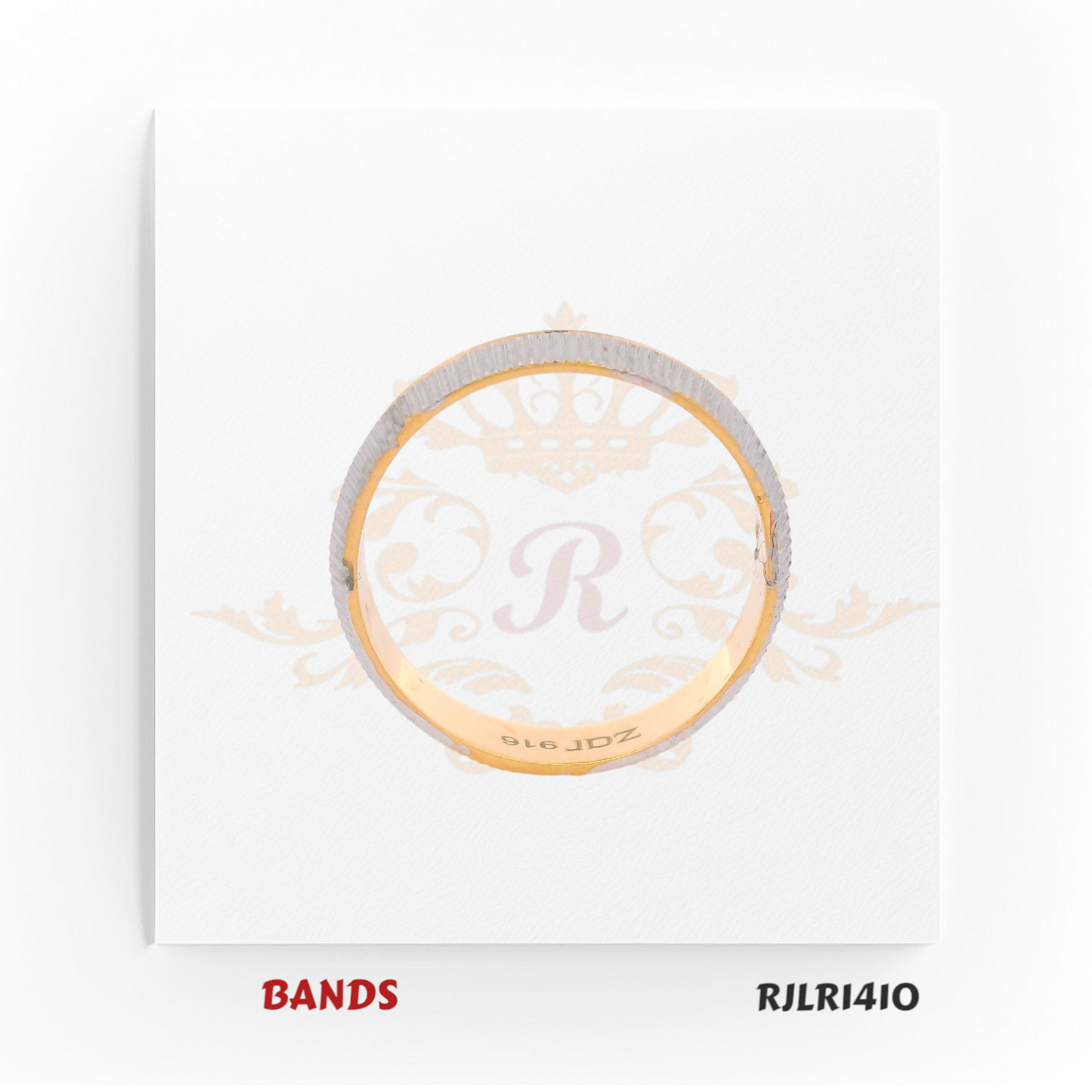 Slim 22kt two-tone gold band with a brushed white gold exterior and polished yellow gold interior. Sleek and modern. Model number RJLR1410.