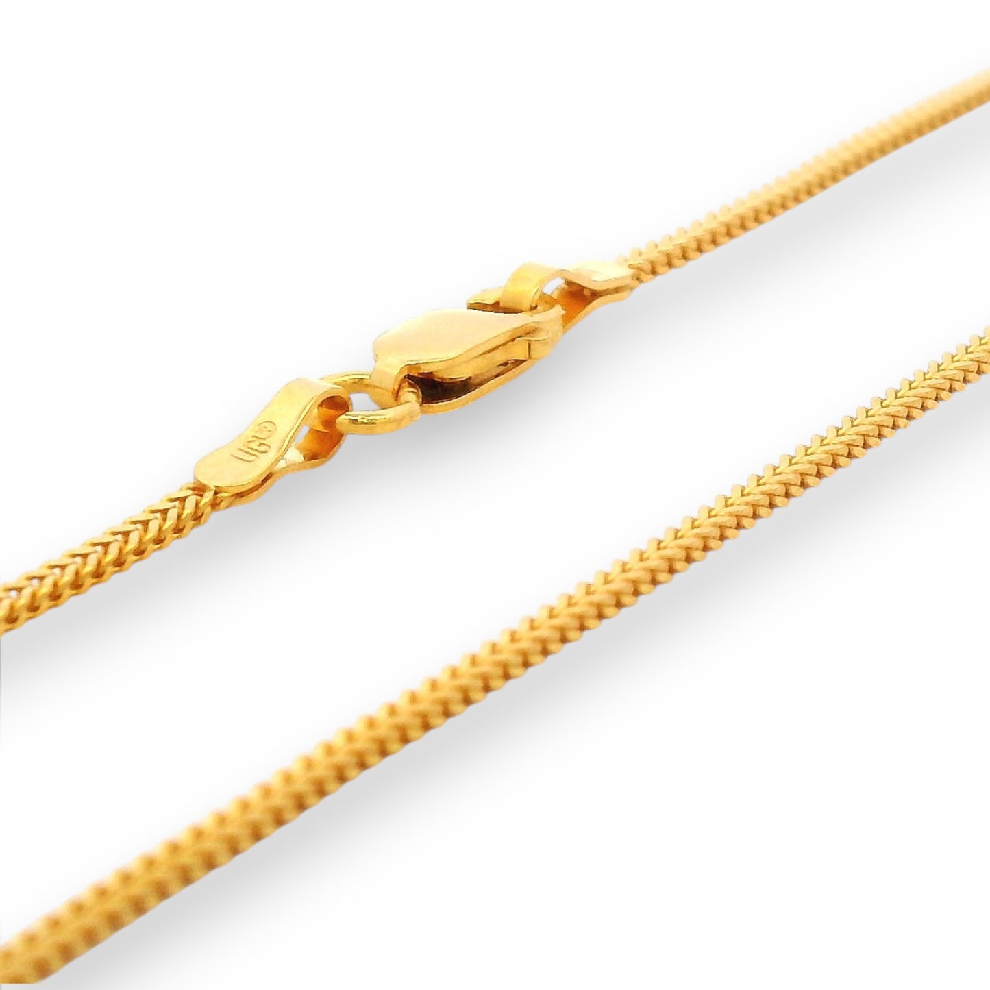 Close-up of 22K gold baby chain (RJC30869a) showcasing intricate rope-link details and a secure gold clasp. A lightweight, elegant piece from Regal Jewels Chicago — perfect for daily wear or gifting.