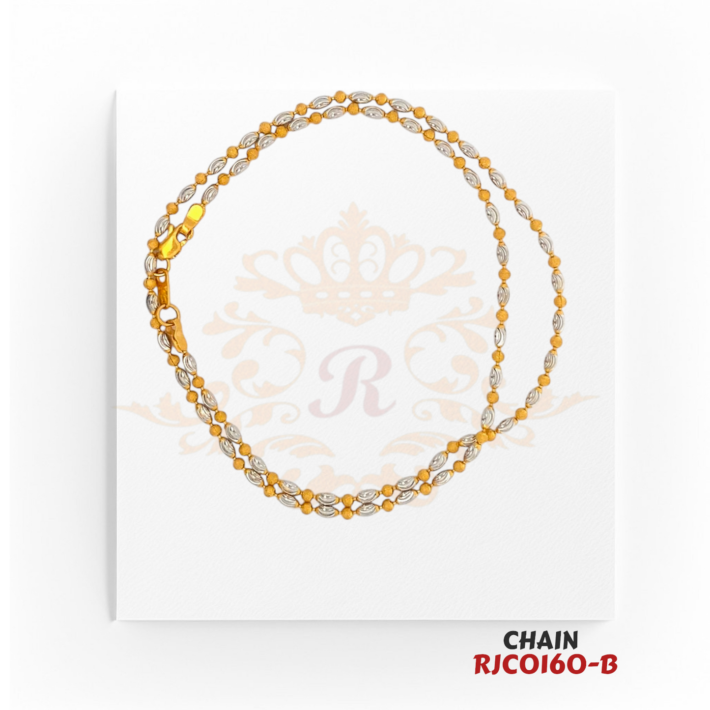22kt Two-Tone Gold Oval Bead Chain RJCO160 – A 7.50-gram, 16-inch yellow gold and rhodium-finished chain. Available at Regal Jewels.