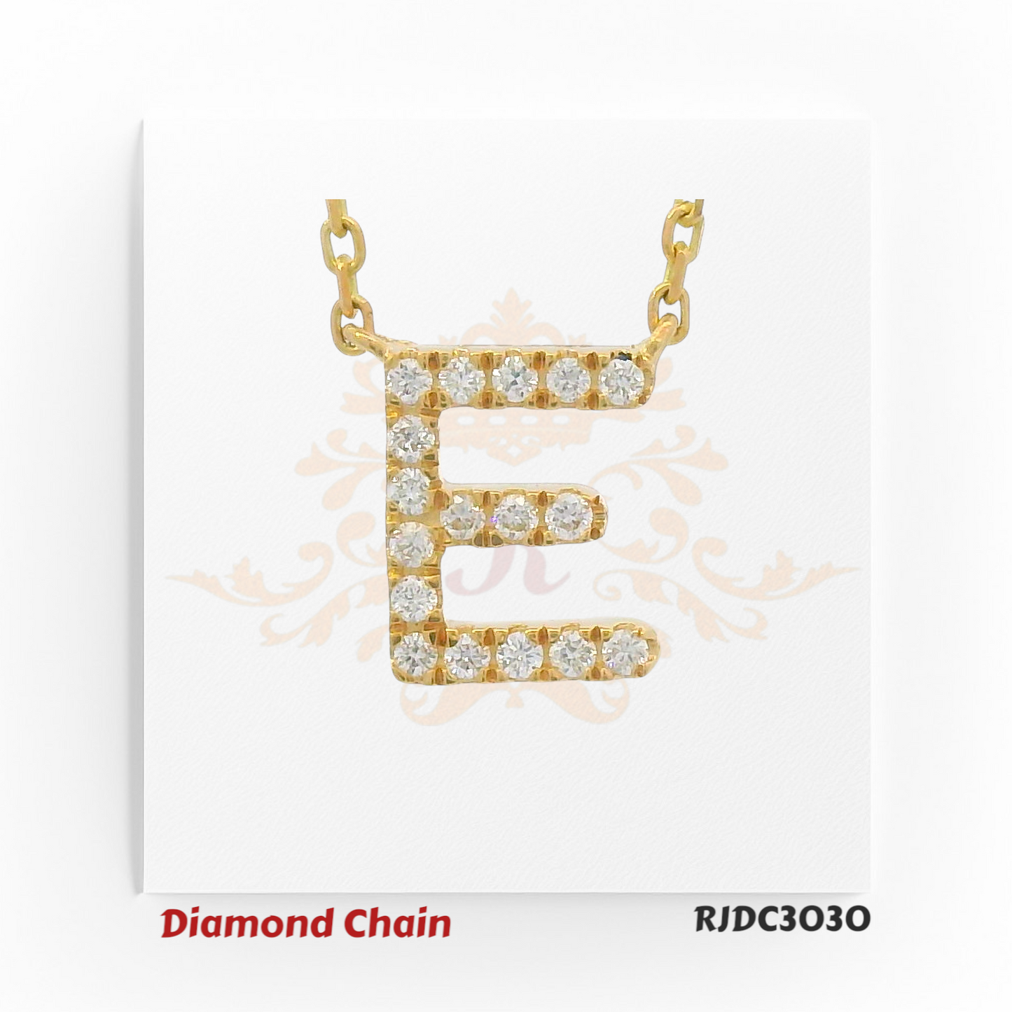 Elegant yellow gold diamond chain featuring a bold pendant in the shape of the letter "E", encrusted with round-cut white diamonds. The pendant is attached to a gold link chain and displayed on a white background with a subtle decorative crown and floral design. Model number RJDC3030 is indicated at the bottom.