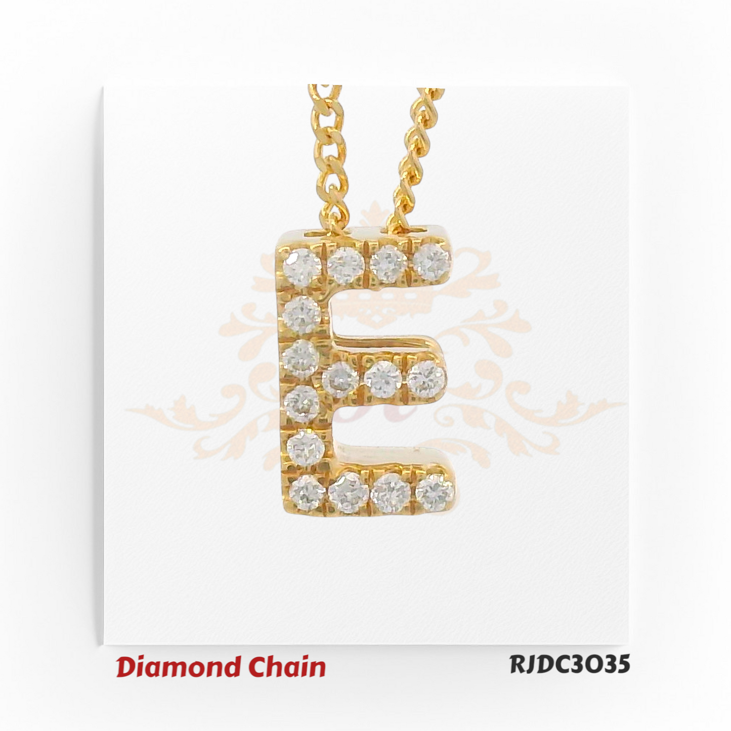 Chic yellow gold diamond chain featuring a bold pendant in the shape of the letter "E", adorned with brilliant round-cut diamonds. The pendant is suspended from a twisted rope-style gold chain and set against a white background with a delicate crown and floral design. Model number RJDC3035 is noted at the bottom.