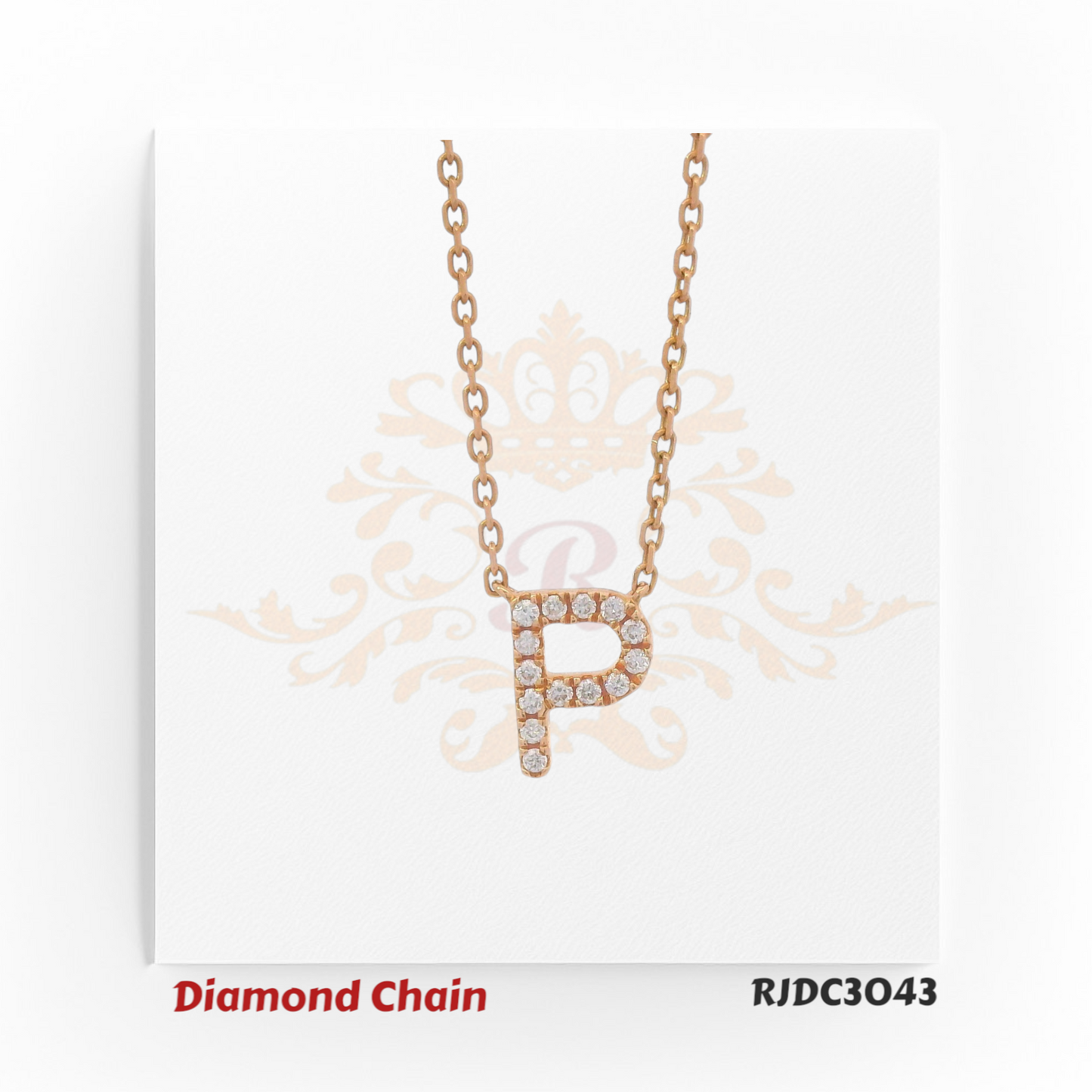 Refined rose gold diamond chain showcasing a pendant in the shape of the letter "P", embellished with sparkling round-cut diamonds. The pendant is suspended from a delicate rose gold link chain and set against a white background with a graceful crown and floral motif. Model number RJDC3043.