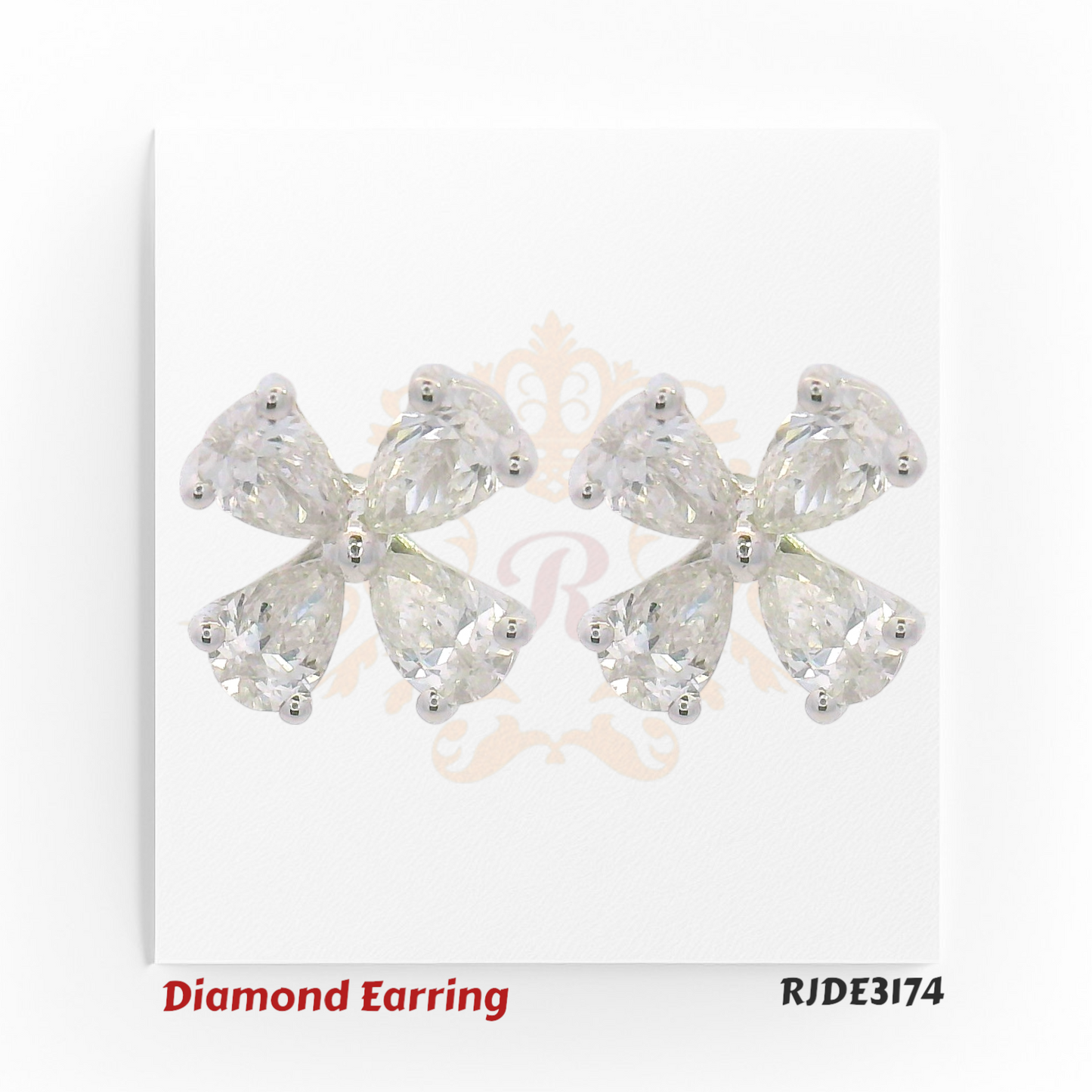 Pair of 18kt white gold earrings featuring clover-shaped designs with four pear-cut diamonds in each stud – Total 0.622ct, Code RJDE3174
