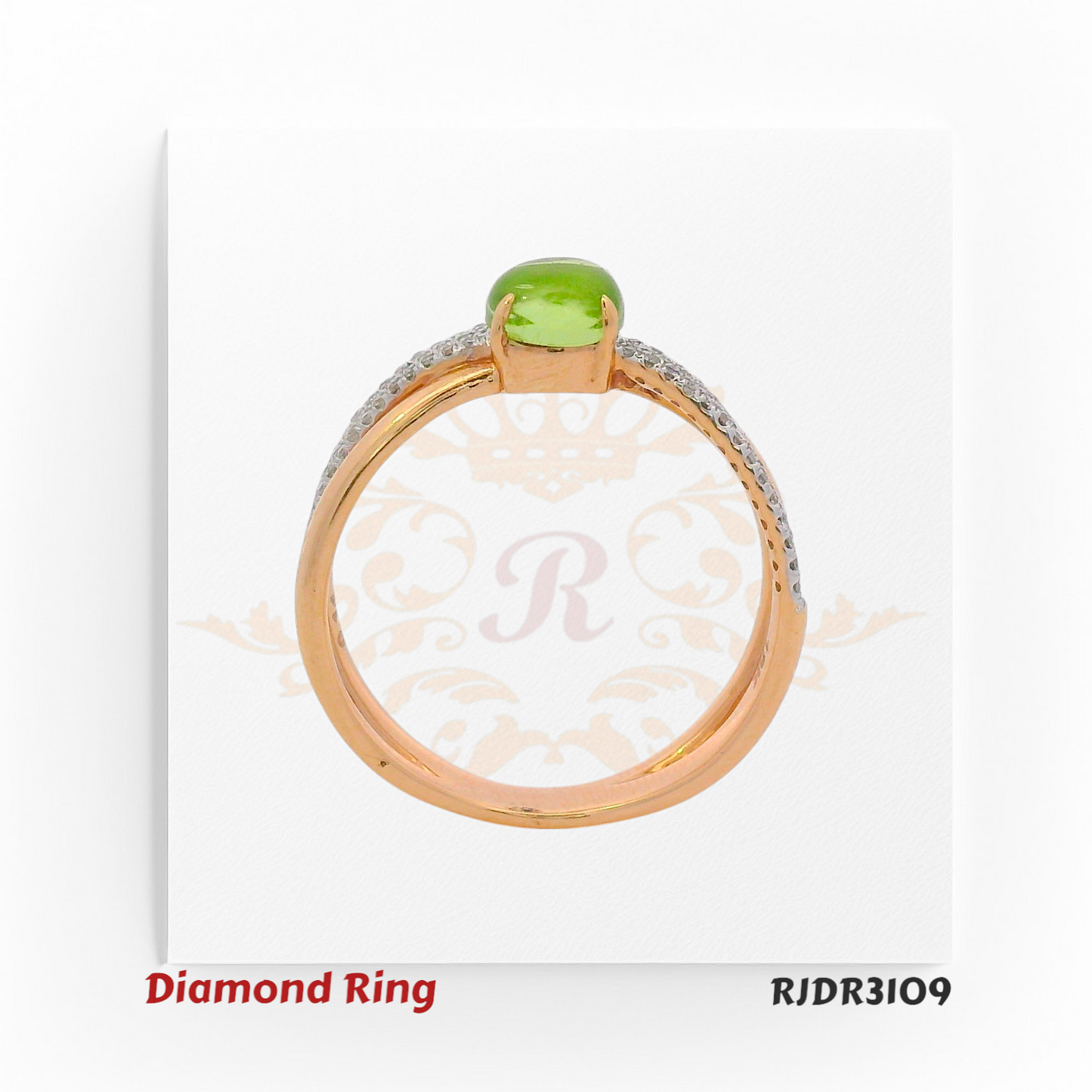 An exquisite 18kt rose gold ring featuring a brilliant round green peridot, framed by a diamond-accented split shank. Model RJDR3109 combines vibrant color with timeless elegance.