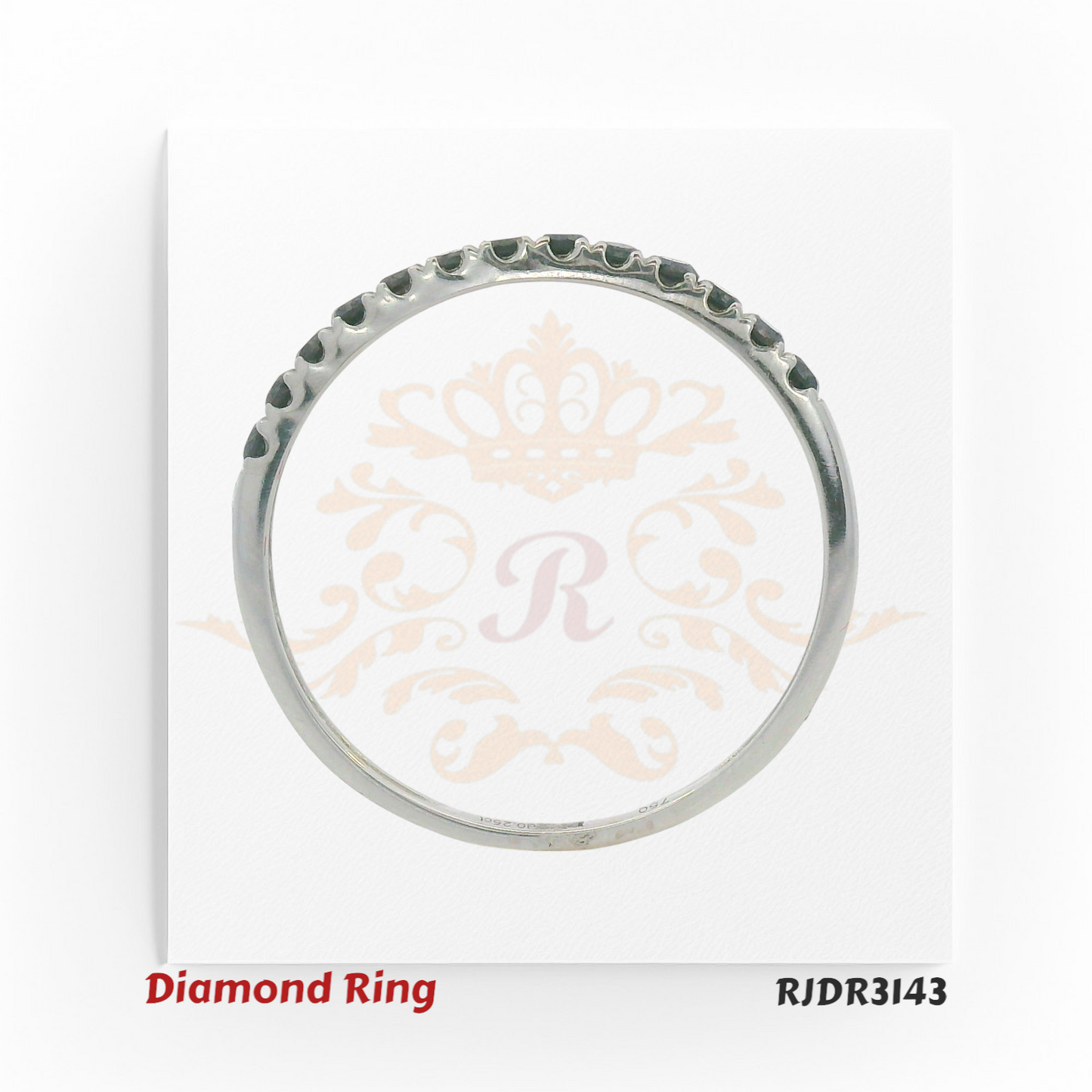 Elegant and modern, this 18kt white gold eternity ring features a continuous line of shimmering round black diamonds – RJDR3143.