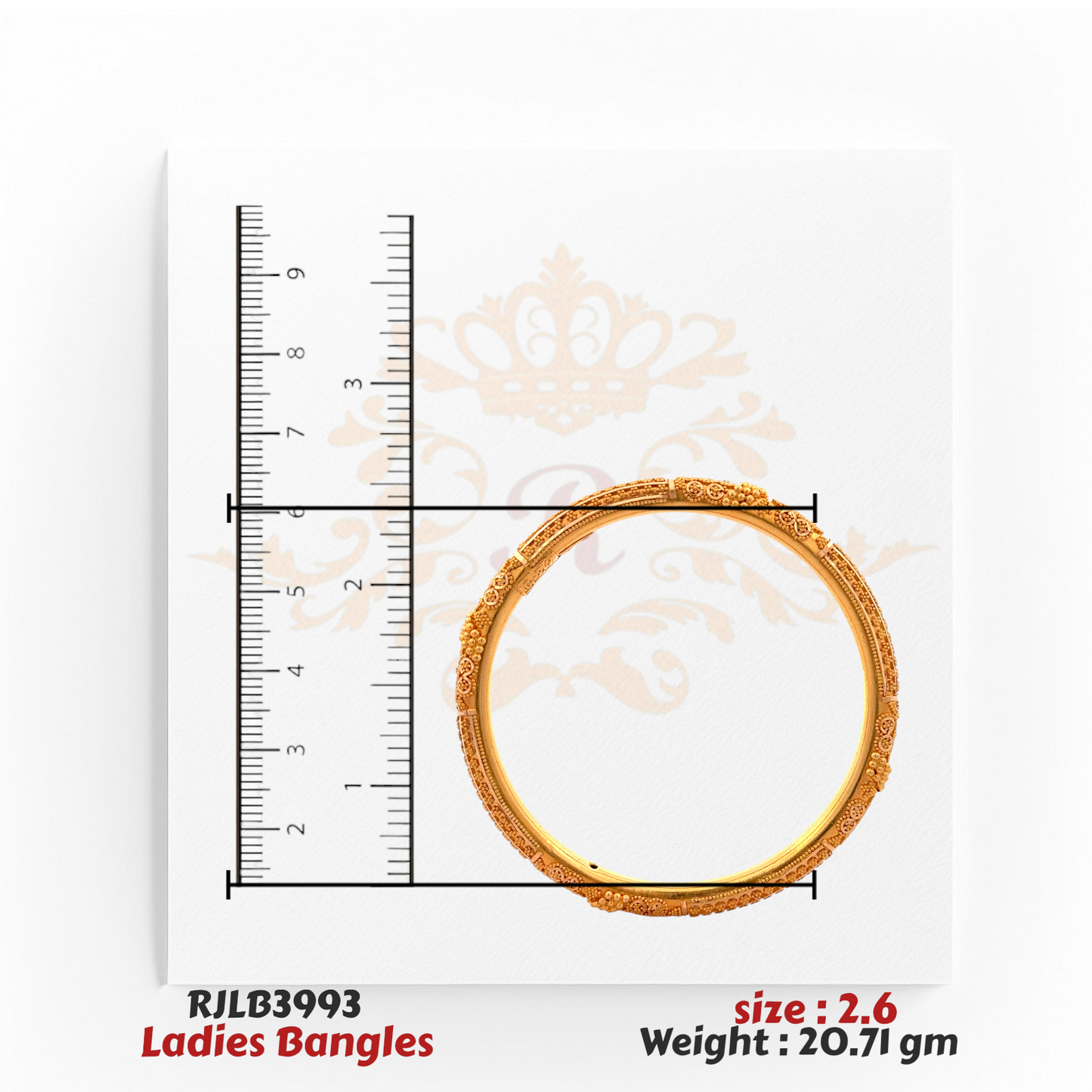 Top view of an ornate gold ladies bangle adorned with intricate floral and beaded detailing along the band, displayed with a ruler for size accuracy. Model RJLB3993.