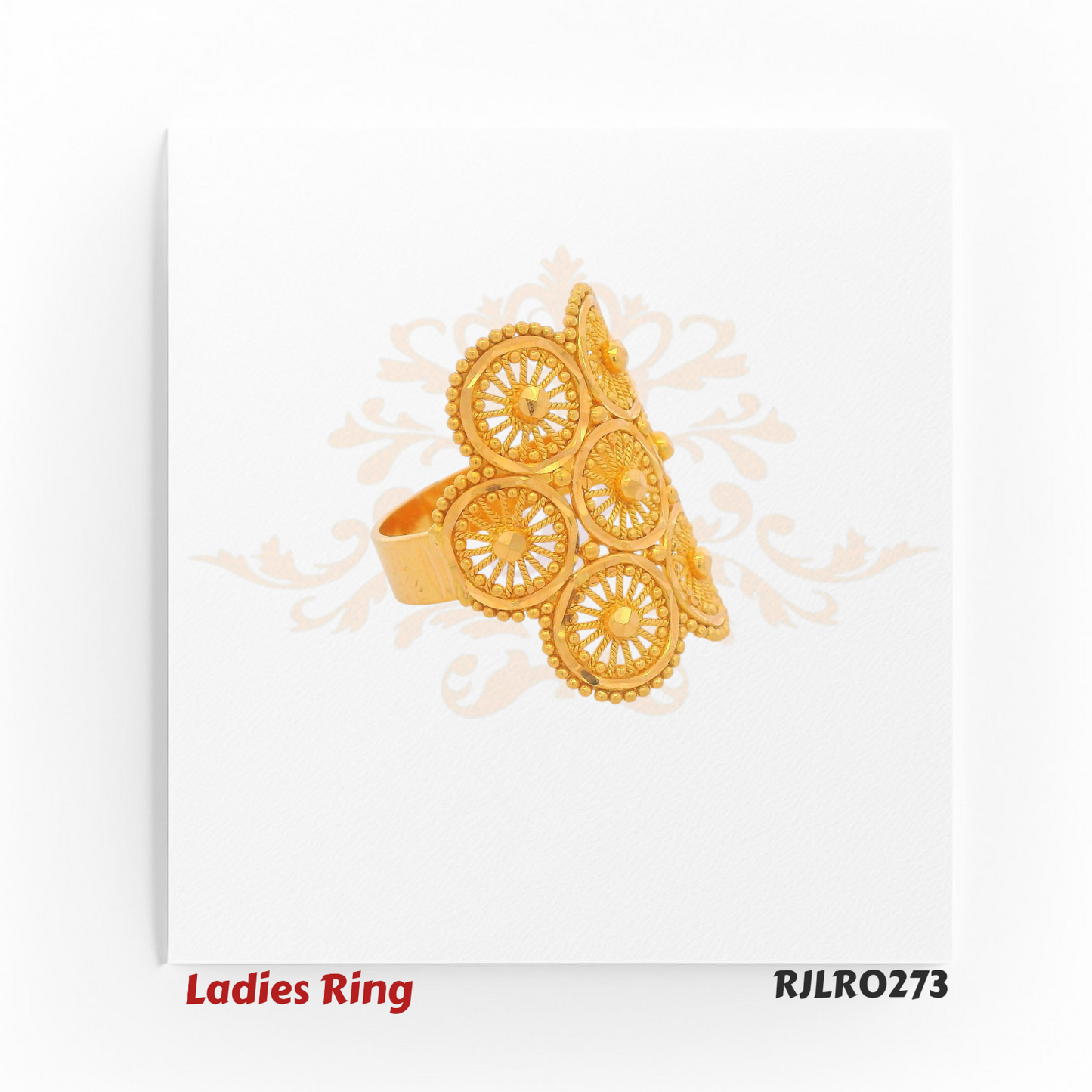 RJLRO273 – Angled side view of a gold ladies ring showing layered circular filigree designs.