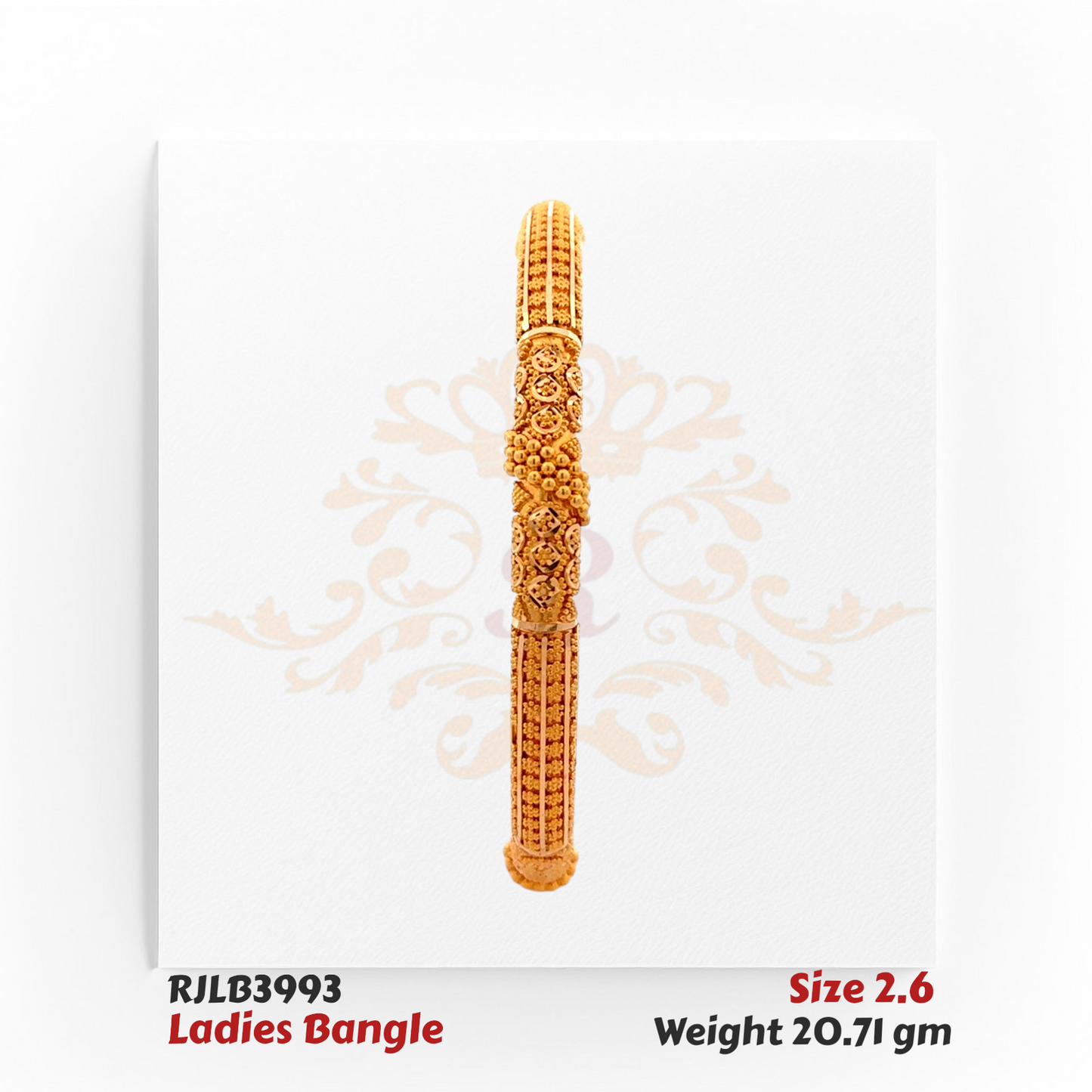 Front view of a gold ladies bangle adorned with intricate floral and swirl engravings, highlighted by a raised dome cluster centerpiece and finely textured segments for an ornate traditional look. Model RJLB3993.