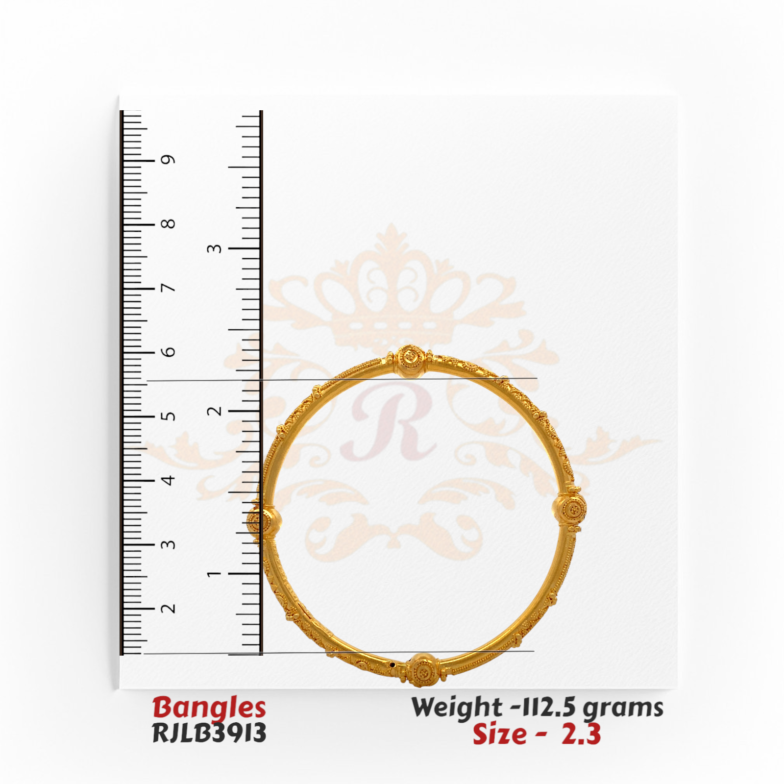Single bangle from RJLB3913 measured against a ruler, confirming size 2.3 with a 2.3-inch inner diameter.