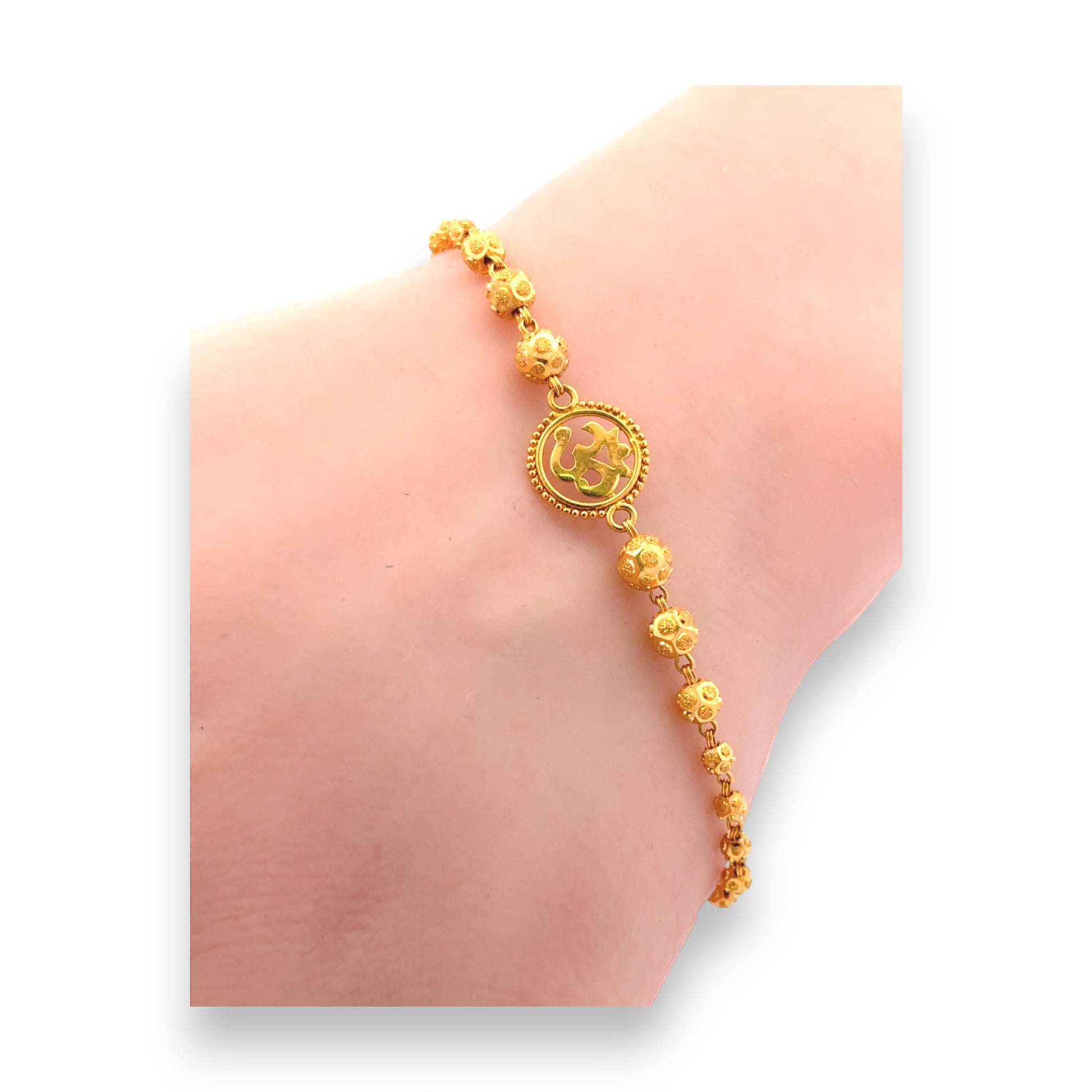 22kt Gold Ladies Bracelet with Om Symbol Centerpiece and Beaded Floral Design – Traditional Hindu Jewelry – Regal Jewels RJLB4048