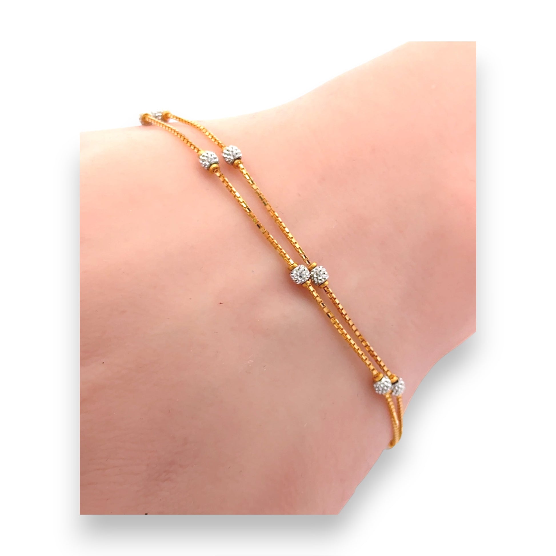 22kt Yellow Gold Double Chain Bracelet with Sparkling Diamond-Cut Stations – Elegant and Modern Women’s Bracelet – Regal Jewels RJLB4056