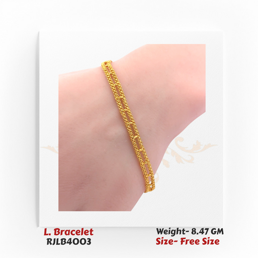 Close-up of a delicate ladies’ bracelet featuring dual interlinked chain strands in polished yellow gold, worn on the wrist. RJLB4003