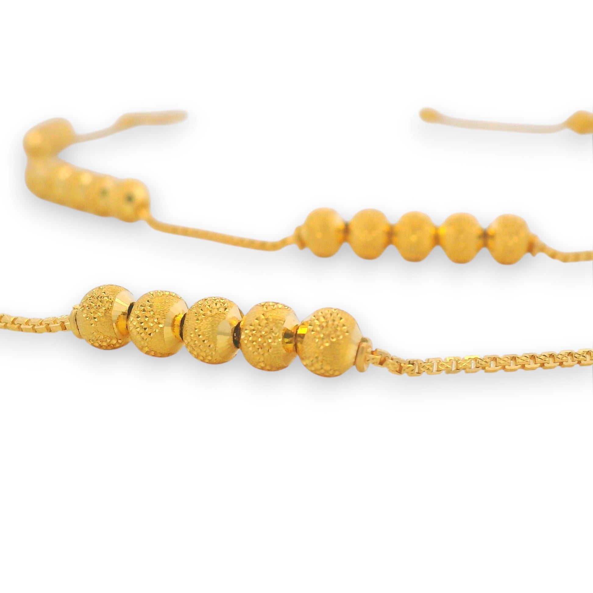 Regal Jewels RJLP3022A 22k gold ladies payal close-up with textured round beads on fine chain, elegant traditional Indian gold anklet design – Regal Jewels Chicago