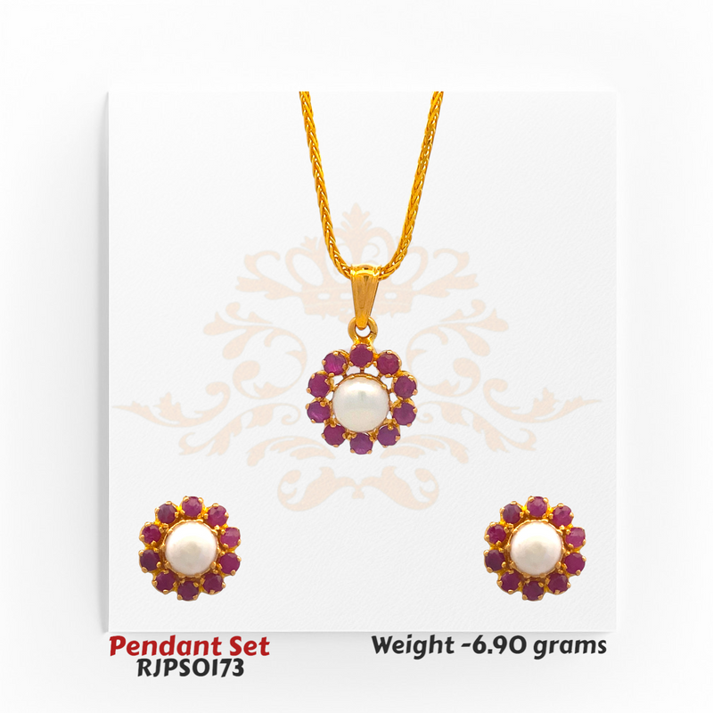 22kt gold floral pendant set with pearl center and red gemstone petals, including matching earrings. Product code RJPS0173, total weight 6.90 grams.