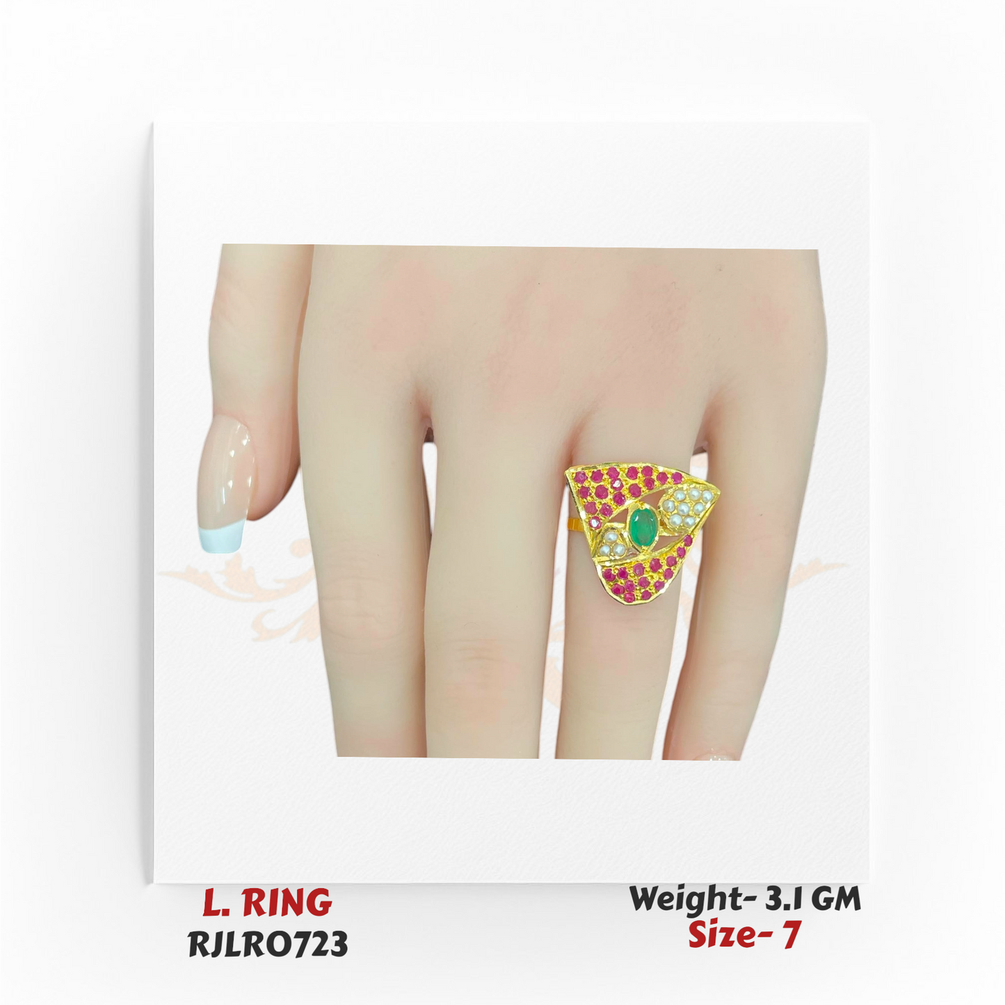 22k yellow gold statement ladies ring featuring a bold triangular design with red stones, white pearls, and a central green gem, shown on a hand. Model RJLR0723