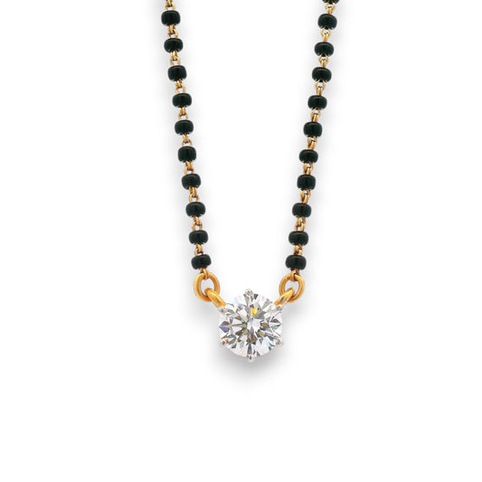 Close-up of solitaire diamond pendant mangalsutra on fine gold and black bead chain – RJM3149A by Regal Jewels