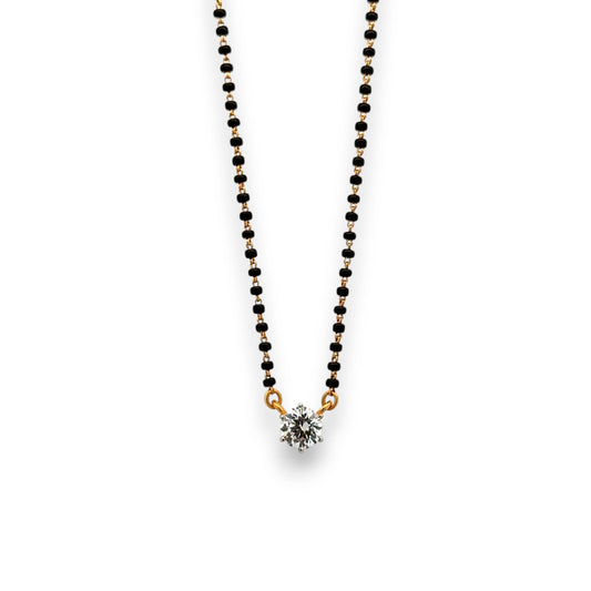 Elegant 22k gold mangalsutra with solitaire diamond pendant and dual black bead chain – Regal Jewels RJM3149