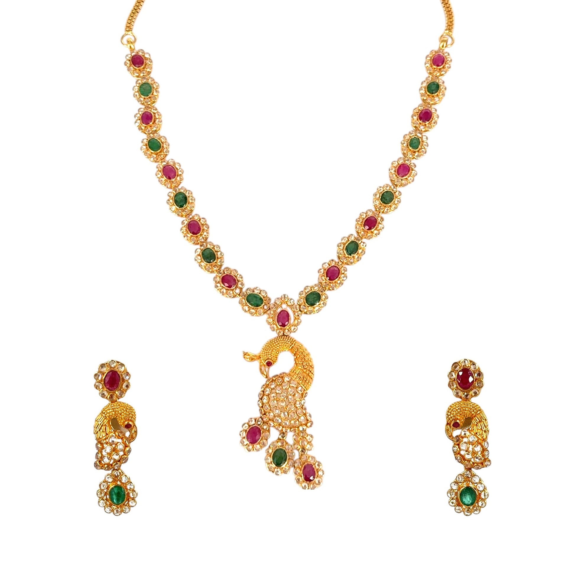 22kt gold peacock bridal necklace set with ruby and emerald stone accents, featuring a detailed peacock pendant and matching earrings – 46.11 gm (RJOMS3031), handcrafted by Regal Jewels Chicago.