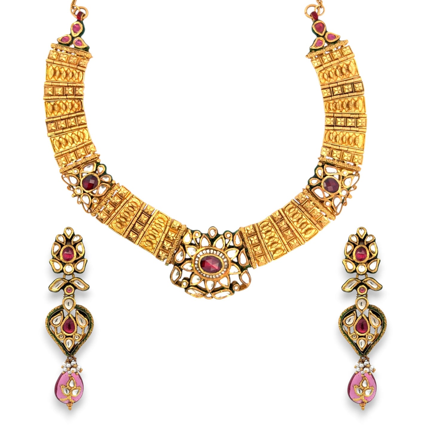 Royal 22kt gold antique Kundan necklace set featuring embossed gold panels with ruby and polki detailing, intricate floral motifs, and matching long earrings. Perfect for bridal, festive, and traditional wear from Regal Jewels Chicago.