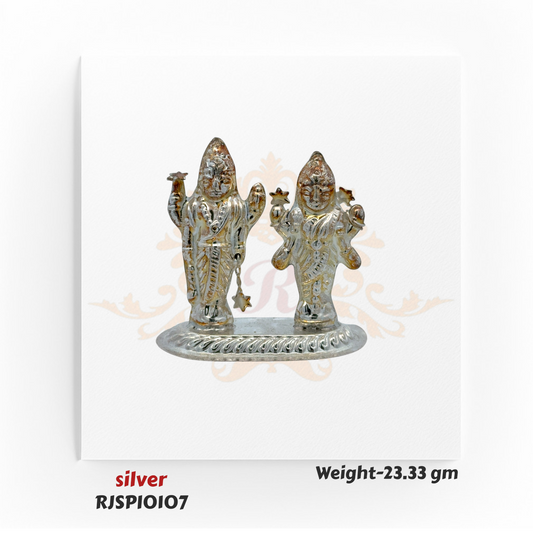 Pair of handcrafted silver deity idols weighing 23.33 gm, designed for pooja rituals, mandir decoration, and gifting during festivals.