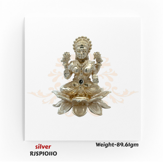 Pure silver Goddess Lakshmi idol RJSPI0110, weighing 89.61 gm, seated on lotus, perfect for pooja rituals, mandir decor, and festive worship.