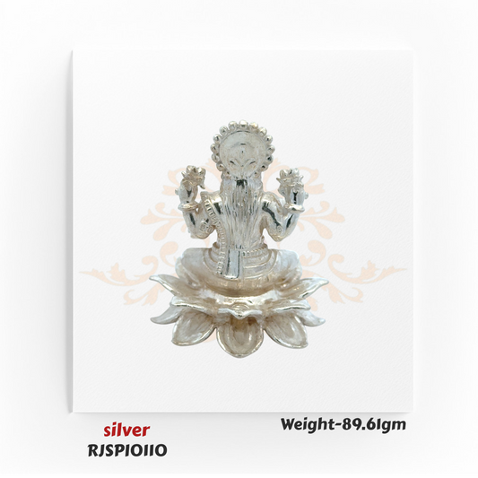 Handcrafted silver Lakshmi statue RJSPI0110, auspicious Hindu deity idol for wealth and prosperity, ideal for Diwali pooja and temple use.