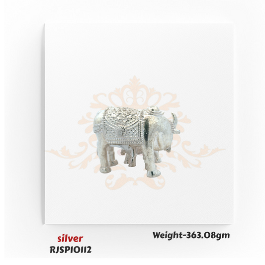 Pure silver Kamdhenu cow and calf figurine RJSPI0112, sacred Hindu idol for wealth, prosperity, and spiritual worship.