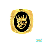 A 22kt gold men's ring with a rectangular top and an oval border, with the word "King" written in yellow with a crown in the middle, and a black background is a bold and regal piece of jewelry. Weight: 12.60 gm Size: 11.5
