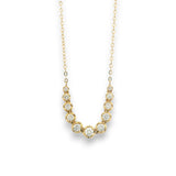 18KT yellow gold curved chain with graduated bezel-set natural diamonds by Regal Jewels