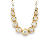 18KT yellow gold curved chain with graduated bezel-set natural diamonds by Regal Jewels