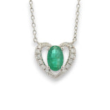 18KT gold heart pendant chain with oval emerald center and diamond halo by Regal Jewels