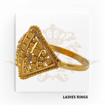 This is an image of a gold ladies ring with a detailed square design featuring various raised geometric patterns and embellishments. The label "LADIES RINGS" is present at the bottom of the image.