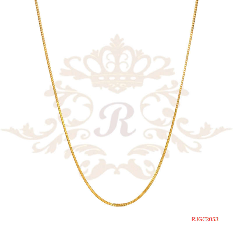 The Gold Chain RJGC2053, an elegant 22kt gold box chain from Regal Jewels. This beautiful chain measures 15 inches in length and weighs 3.60 grams. It showcases a classic box chain design, known for its simple and sophisticated look. Crafted with high-quality 22kt gold, this chain is a beautiful and versatile piece of jewelry suitable for both men and women.