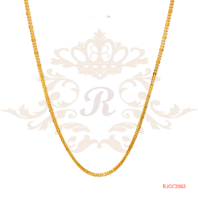 The Gold Chain RJGC2063, a stunning and elegant piece of jewelry from Regal Jewels. This chain is crafted from high-quality 22kt yellow gold, weighing 9.90 grams. With its classic design, this chain is both timeless and versatile, making it a perfect accessory for any occasion. Its exquisite craftsmanship and attention to detail make it a must-have addition to any jewelry collection.