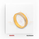 Crafted in 22kt gold, this two-tone band showcases a smooth yellow gold surface with an elegant white gold diagonal accent. Model RJLR0603 delivers a contemporary look with timeless appeal.