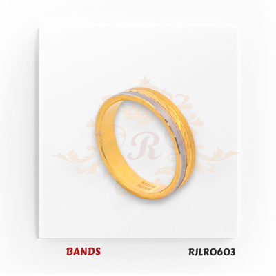 Crafted in 22kt gold, this two-tone band showcases a smooth yellow gold surface with an elegant white gold diagonal accent. Model RJLR0603 delivers a contemporary look with timeless appeal.