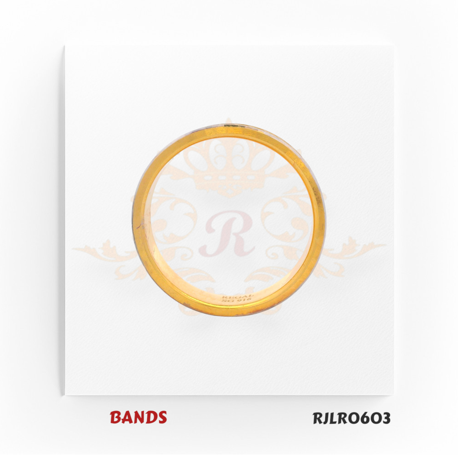 Modern 22kt dual-tone gold band featuring a polished yellow gold base highlighted by a stylish white gold diagonal groove. Model RJLR0603 offers a bold yet refined touch for any jewelry collection.