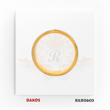 Modern 22kt dual-tone gold band featuring a polished yellow gold base highlighted by a stylish white gold diagonal groove. Model RJLR0603 offers a bold yet refined touch for any jewelry collection.