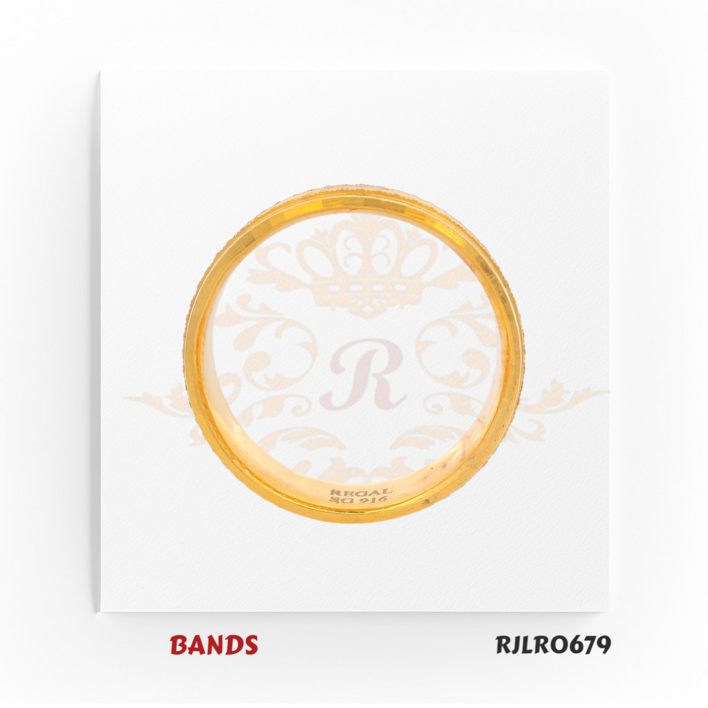 Timeless 22kt yellow gold band accented with delicate grooved edges, blending classic elegance with understated detailing. Model RJLR0679