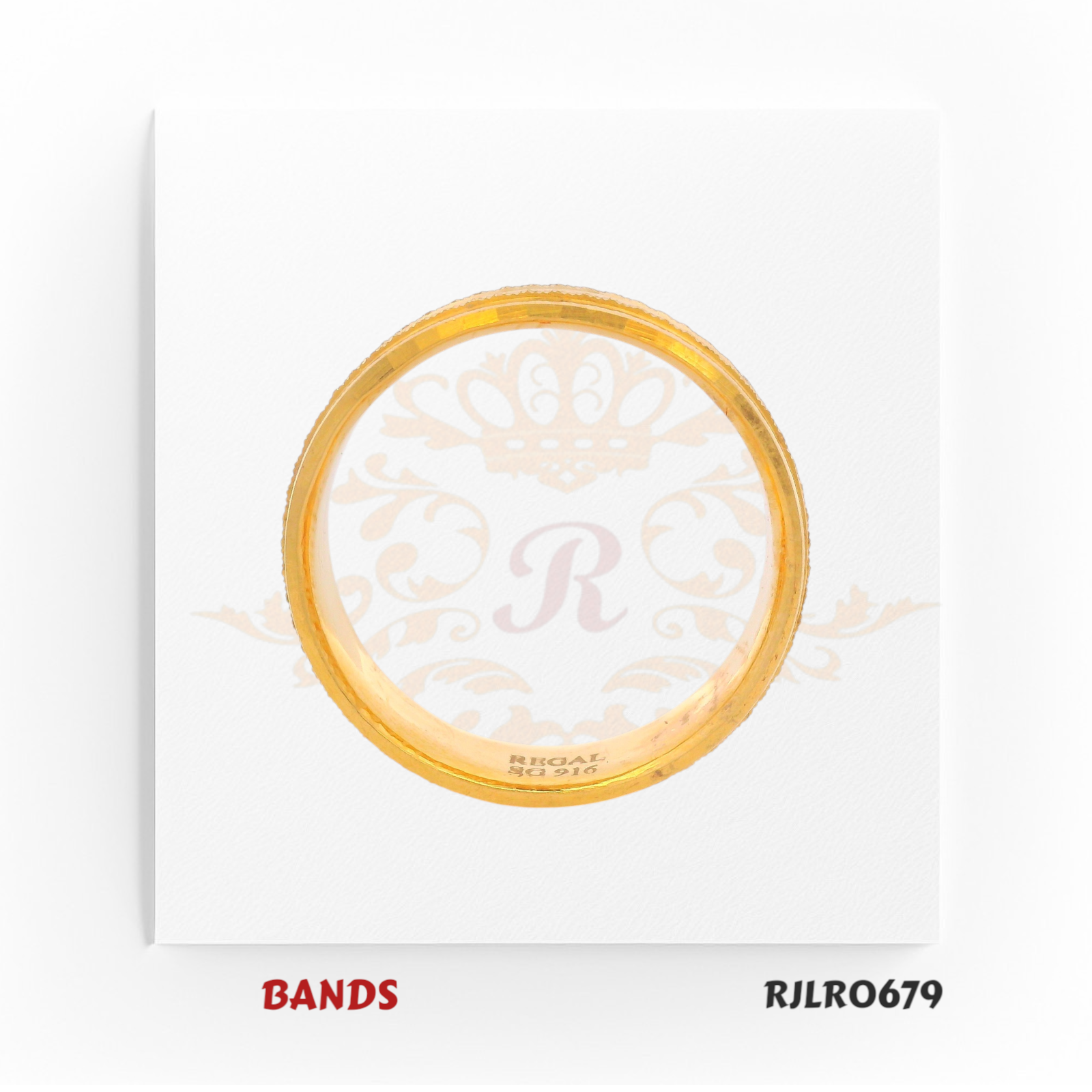 Timeless 22kt yellow gold band accented with delicate grooved edges, blending classic elegance with understated detailing. Model RJLR0679