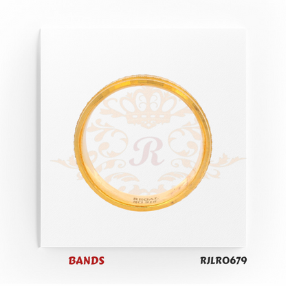 Timeless 22kt yellow gold band accented with delicate grooved edges, blending classic elegance with understated detailing. Model RJLR0679