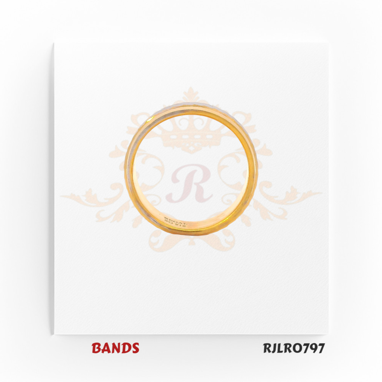 Contemporary yellow gold band ring accented with a diagonal white textured inlay, combining modern elegance with classic gold artistry. Model RJLR0797.