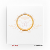 Contemporary yellow gold band ring accented with a diagonal white textured inlay, combining modern elegance with classic gold artistry. Model RJLR0797.