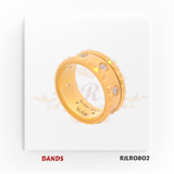 Striking 22kt yellow gold band with sharp faceted edges and bezel-set diamond accents, exuding a refined yet masculine elegance. Model RJLR0802.