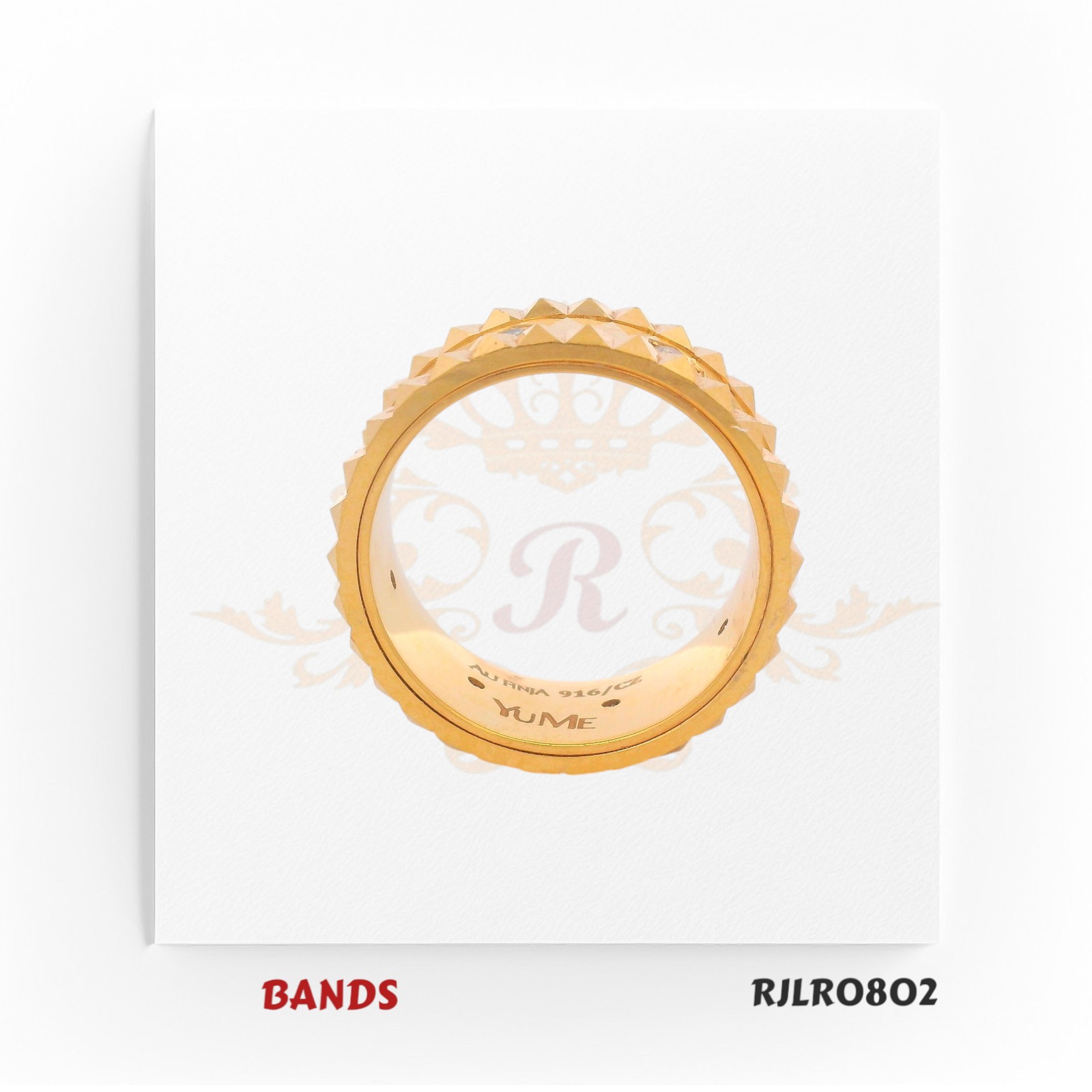Luxurious 22kt yellow gold ring featuring a bold faceted edge and sparkling bezel-set diamonds, crafted for a strong and sophisticated style. Model RJLR0802