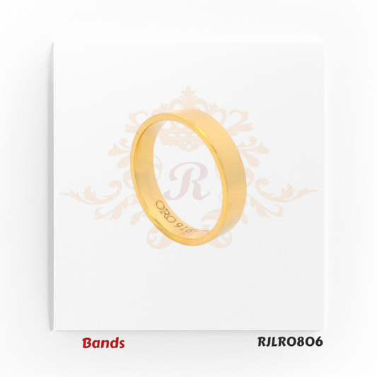 This 22kt gold ring stands out with its striking sky blue enamel dots set in a neat grid design, adding a pop of color and modern flair to a classic gold band. Style Code: RJLR1304.